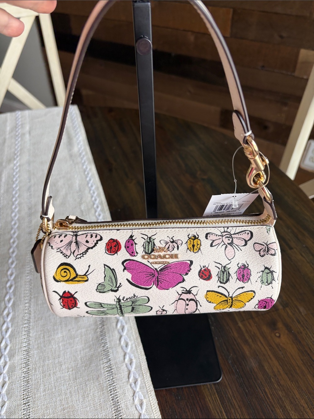 Coach Nolita mini Barrel bag. Multicolor Floral & Bug Print